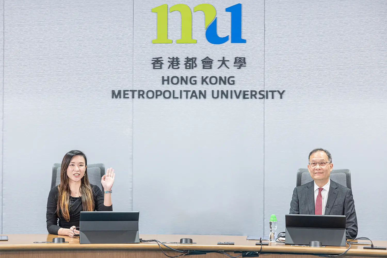 President Prof. Paul Lam discusses University developments with staff in Town Hall Meeting